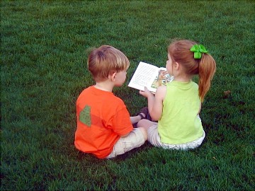 This photo of a couple of kids sharing the fun of reading a children's book was taken by photographers Tim & Annette of Buenos Aires, South America.